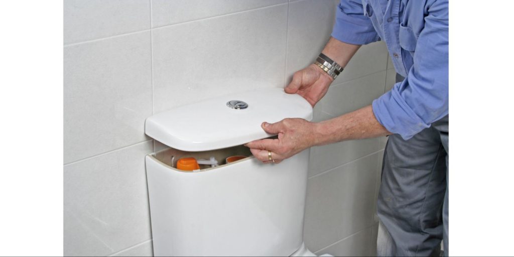 Remove the lid of your toilet's tank