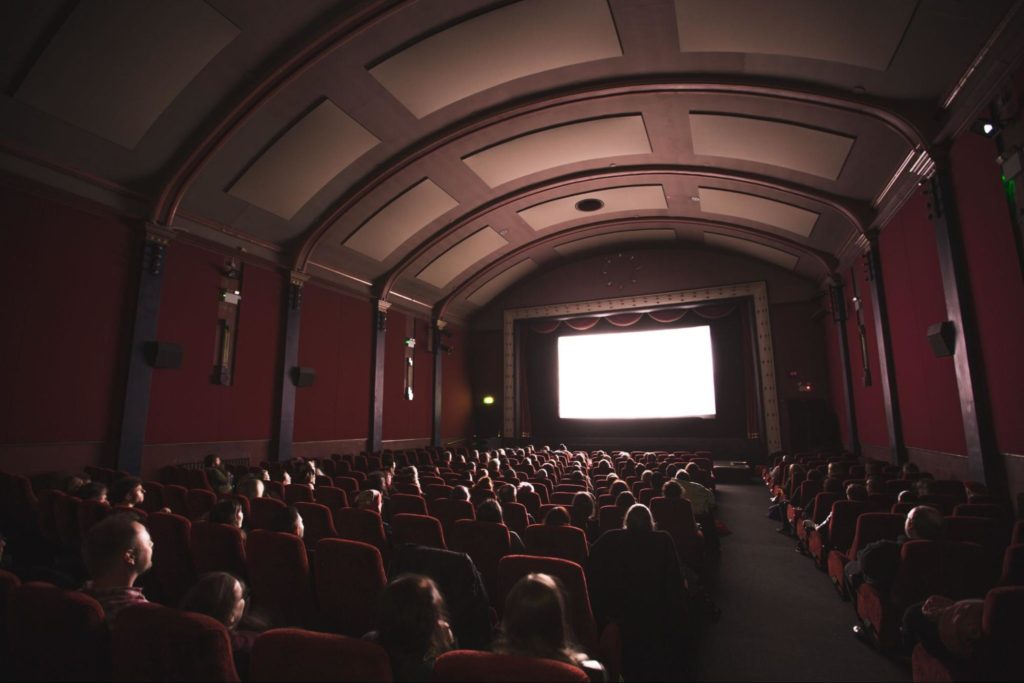 Watch a movie in theaters